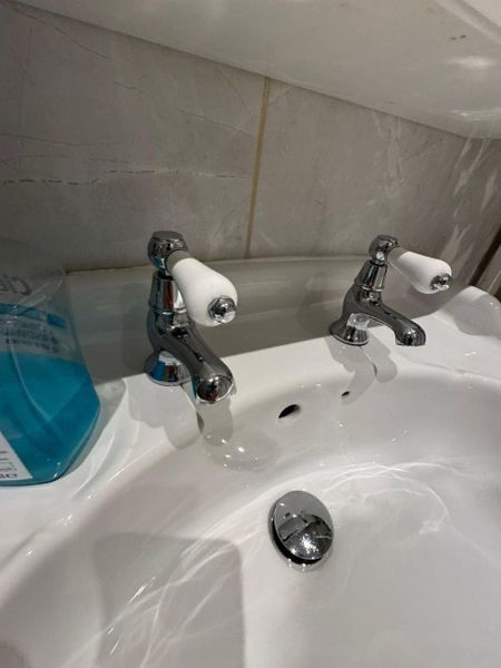 Bathroom taps after cleaning